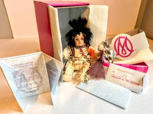 lot 5052 image: Marie Osmond Fine Collectible Dolls Mato Tiny Tot with Certificate of Authenticity and a Doll Necklace for You