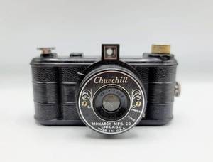 lot 5042 image: Vintage Churchill Monarch Mfg Co. Camera with Graf Lens in original box