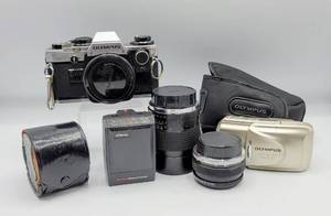 lot 5043 image: Vintage Olympus OM-10 35mm SLR camera - Zuiko 50mm lens - 2 more lenses, Olympus Stylus Epic and Strobe