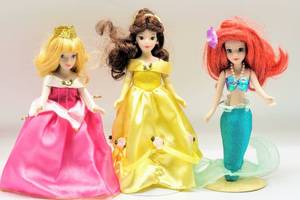 lot 5107 image: Three Porcelain Disney Princess Dolls - Belle, Ariel and Aurora
