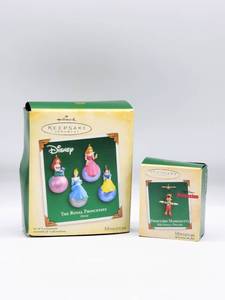 lot 5118 image: (2) Hallmark Keepsakes Disney Miniature Ornaments in Boxes - Disney Princesses and Pinocchio