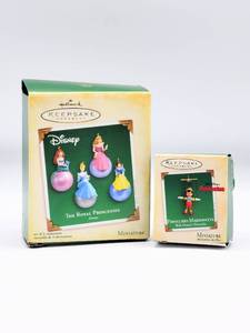 lot 5119 image: (2) Hallmark Keepsakes Disney Miniature Ornaments in Boxes - Disney Princesses and Pinocchio