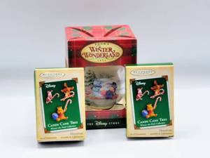 lot 5121 image: Disney Ornaments (2) Hallmark Keepsakes 2004 Winnie The Pooh Candy Cane Trio and Poohs Winter Wonderland 1996 from The Disney Store  All in Original Boxes