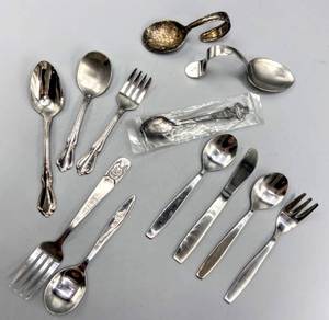 lot 5070 image: 12 piece set of miniature utensils, Including 5 inch Chicago tribune 1978 stainless fork by Bonnie also Geneva Rolex collectible Bucherer of Switzerland spoon still in plastic RX half and 1 teaspoon serving by echo stainless and more