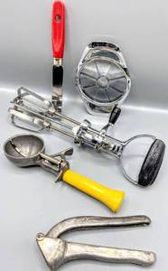 lot 5067 image: Vintage Lot ECKO BEST Stainless Steel Black Plastic Handle Hand Mixer, Egg Beater, USA Bonny Prod. Co. #16 Yellow Ice Cream Scoop, Made In Italy Garlic Press and Red Plastic Handle Cheese Knife Made in China