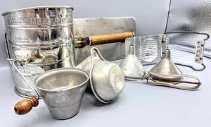 lot 5068 image: Vintage ECKO Measuring Sifter, ECKO Aluminum Measuring Cup, Mixing Cups and Funnels, ECKO Slip Proof Peeler, Aluminum Egg Slicer and Vtg Bloomfield Industries Chicago Ill. Food Press, Sandwich Press, Patty Press