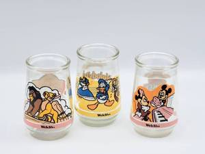 lot 5127 image: (3) Disney Collectible Welchs Juice Cups The Spirit of Mickey, The Lion King II Simbas Pride and Disneys Melody Time