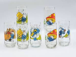 lot 5175 image: 1982 Peyo SMURF Glasses - Set of 7 Smurf 6t Glasses