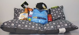 lot 322 image: Puppy Starter Kit Assorted Supplies.