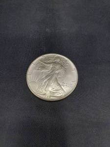 lot 2030 image: 1986 USA Walking Liberty 1 Oz Silver Dollar