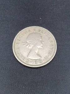 lot 2033 image: 1954 United Kingdom one shilling