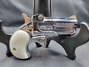 lot 2063 image: Cobra Enterprise Inc C22 22 Mag Derringer with Pearl grips