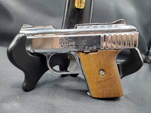 lot 2070 image: Raven Model P-25