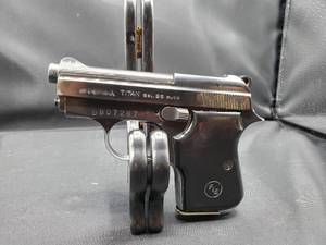 lot 2076 image: FIE Titan .25 ACP Pistol