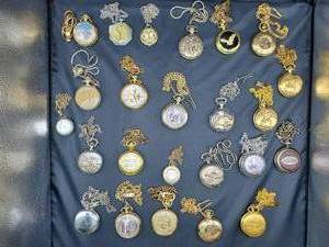 lot 2124 image: Lot of 25 Pocket Watches w Chains