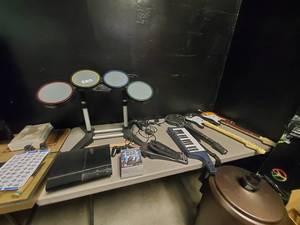 lot 2170 image: PlayStation 3 with 6 Games, Drums, Key-tar, and 3 Guitars