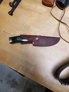 lot 2670 image: Ducks Unlimited Buck Knife with Leather Sheath- Very RARE- Buck 192