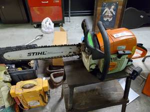 lot 2693 image: Stihl MS310 gas Chainsaw w blade guard
