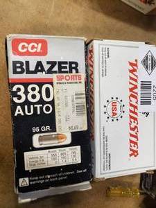 lot 2205 image: Full Box Winchester 380 Auto and Partial Box of Blazer 380 Auto