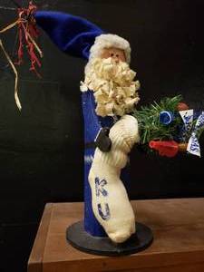 lot 2238 image: Wooden KU Santa Claus