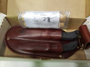 lot 2274 image: North American Hunting Club Knife Set with Leather Sheath
