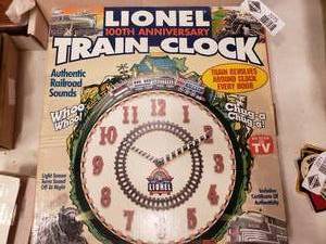 lot 2275 image: Lionel 100th Anniversary Train Clock