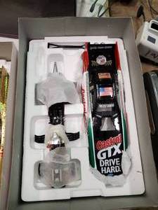 lot 2407 image: Mac Tools Collectors Club Castrol GTX Die Cast Drag Car