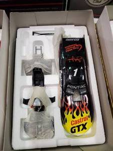 lot 2409 image: Mac Tools Castrol GTX Die Cast Drag Car