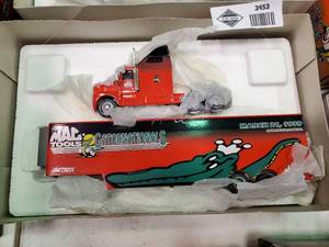 lot 2453 image: Mac Tools Gator Nationals Die Cast Semi and Enclosed Trailer