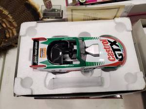 lot 2467 image: Action John Force Limited Edition Die Cast Pedal Car