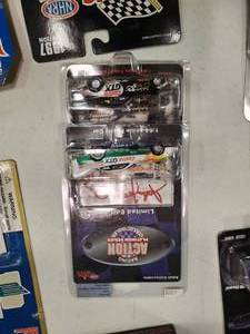 lot 2487 image: 2 John Force Action Platinum Series Die Cast Cars