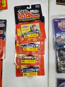 lot 2493 image: Lot of 4 Racing Champions 1997 Die Cast Cars
