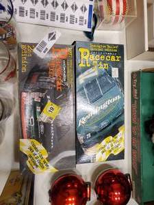 lot 2519 image: Lot of 2 Collectible Remington Racecar Tins