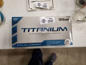 lot 2526 image: 18 Wilson Titanium Golfballs