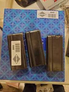 lot 2552 image: 3 M1 Carbine Magazines Full of .30 Carbine