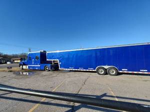 lot 5 image: 1996 Kodiak Lo-Pro w10 Camper box and 2000 Haulmark Enclosed Car Trailer