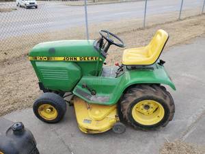 lot 11 image: John Deere 210 Tractor- Runs and Drives