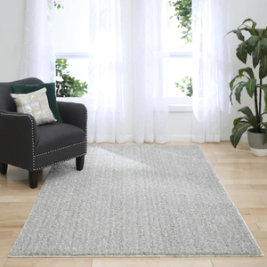 lot 410 image: Mohawk Home Enchantment 8 x 10 Dove Eyelash Indoor Solid Area Rug