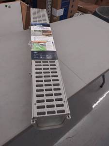 lot 3949 image: NDS 864G 5-Inch Pro Series Channel Drain, Grey- UNKNOWN IF COMPLETE