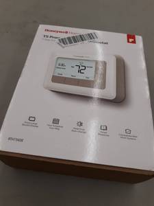 lot 4411 image: Honeywell RTH7560E1001 GrayWhite 7-Day Programmable Thermostat