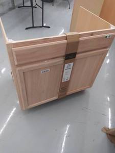 lot 4457 image: Kitchen Classics 35-in x 36-in x 23.75-in Unfinished Oak Sink Base Cabinet- DAMAGED NO BACK
