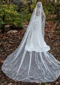 lot 7567 image: 138 Long Cathedral Veil White with Flower and Sequence Design Showering From Head to Midway