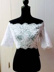 lot 7547 image: Jordan Fashions Size 8 White Off the Shoulder Bridal Wedding Jacket Bolero Top