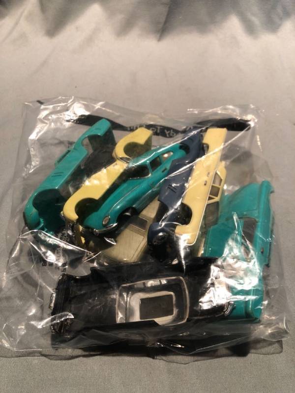 lot 4824 image: Lot of 8 Toy Car Covers Location Shelf 3