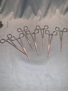 lot 1396 image: Lot of Seven Columbia 7 14 Inch Hemostats Location Shelf 7
