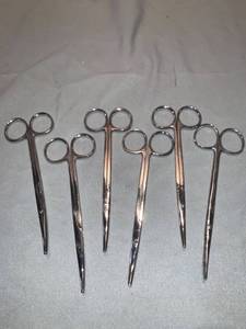 lot 1397 image: Lot of Six 5 12 Inch Curved Surgical Scissors Lot of Seven Columbia 7 14 Inch Hemostats Location Shelf 7