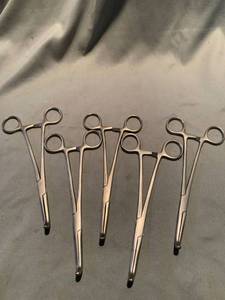 lot 1398 image: Lot of Five Columbia 7 14 Inch Locking Curved Hemostats Lot of Seven Columbia 7 14 Inch Hemostats Location Shelf 7