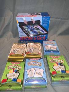 lot 77383 image: Game Lot Rules Twist Card Games and Stow and Go Puzzle Mat Location Shelf 1