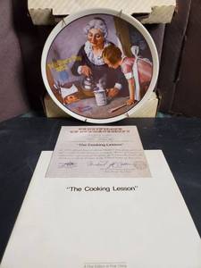lot 77496 image: The Cooking Lesson. By Norman Rockwell. Decorative Plate. with Certificate