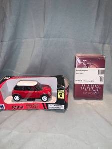 lot 80411 image: Lot of 5 Mars Passport Pocket Notebooks and a Mini Cooper Diecast Toy Lot of Seven Columbia 7 14 Inch Hemostats Location Shelf 7